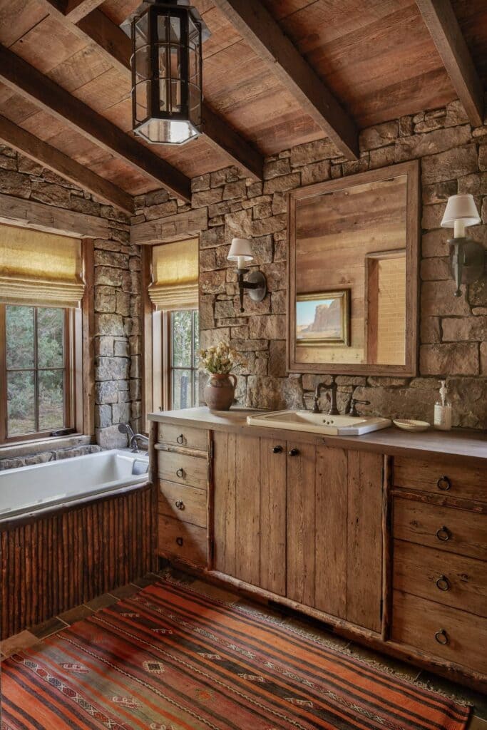 A view of a bathroom space with wooden cabinets