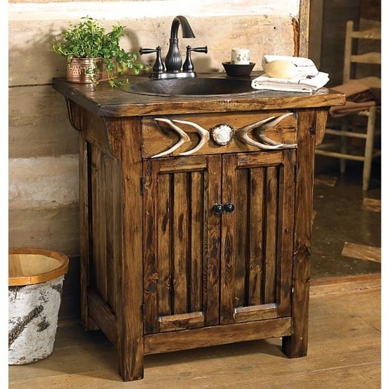 A view of a rustic bathroom vanity under the sink