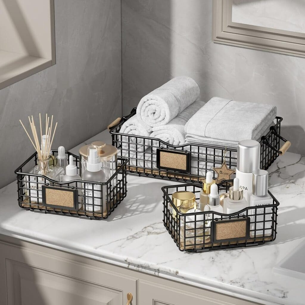 A view of storage baskets kept inside a bathroom with accessories and towels in them