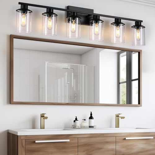 lighting fixtures above the mirror in the bathroom