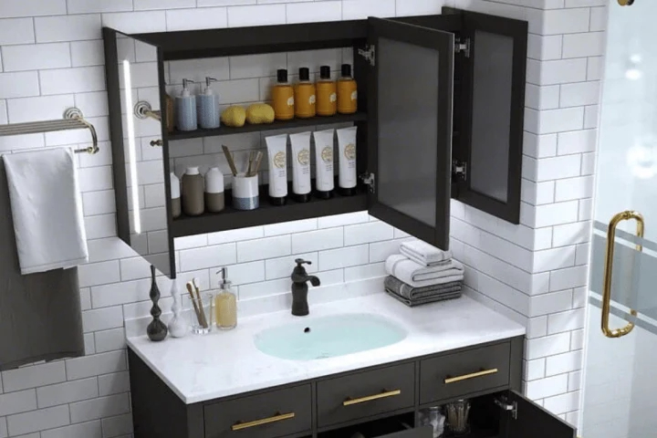 stroage cabinet right above the sink in a bathroom toiletries placed in cabinet