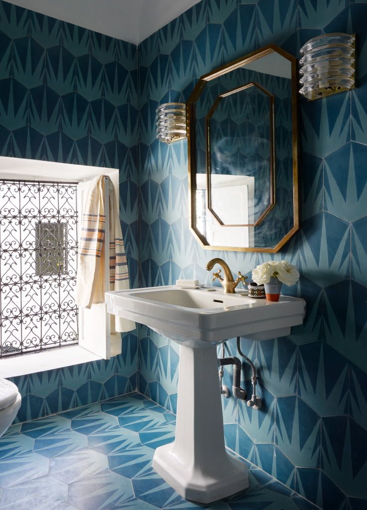 A view of blue designed tiles inside a bathroom