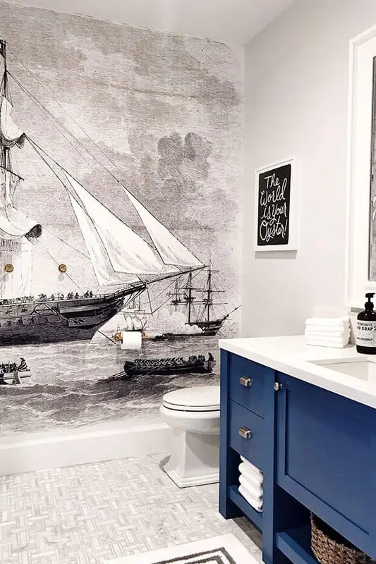 nautic theme with blue and white theme in a bathroom