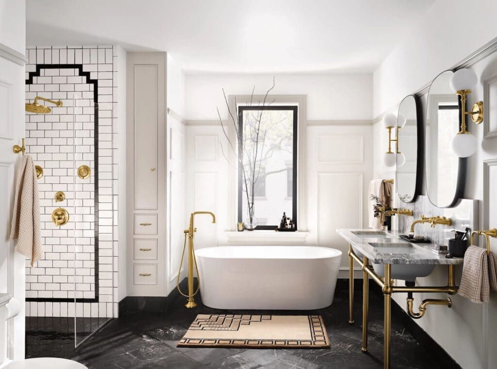 art deco bathroom with gold accents black floorm white wallsm marbel countertops