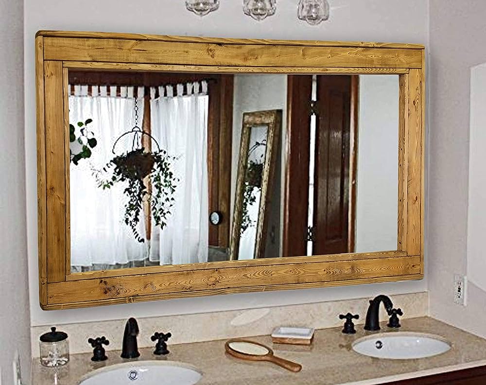 A view of a double vanity wooden mirror