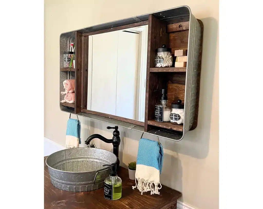 A view of a shelved bathroom mirror