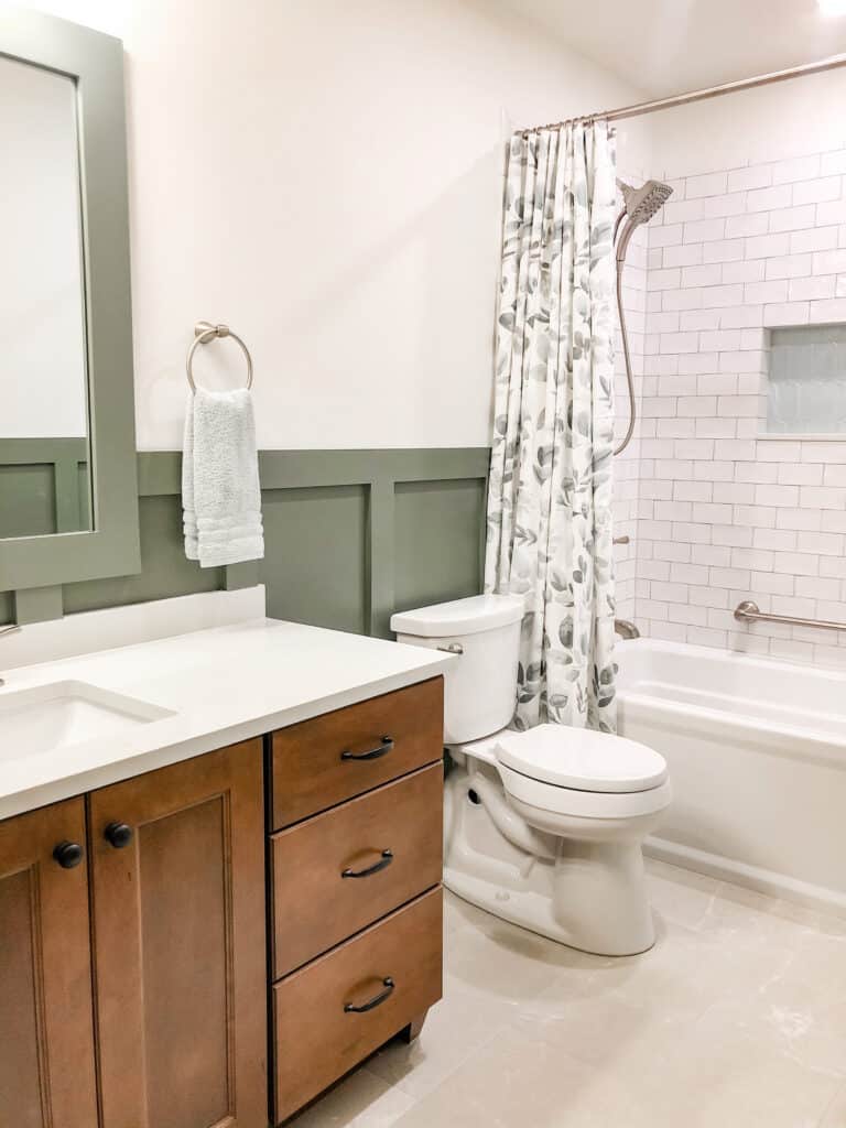 board and batten bathroom wooden brown vanity textured wall