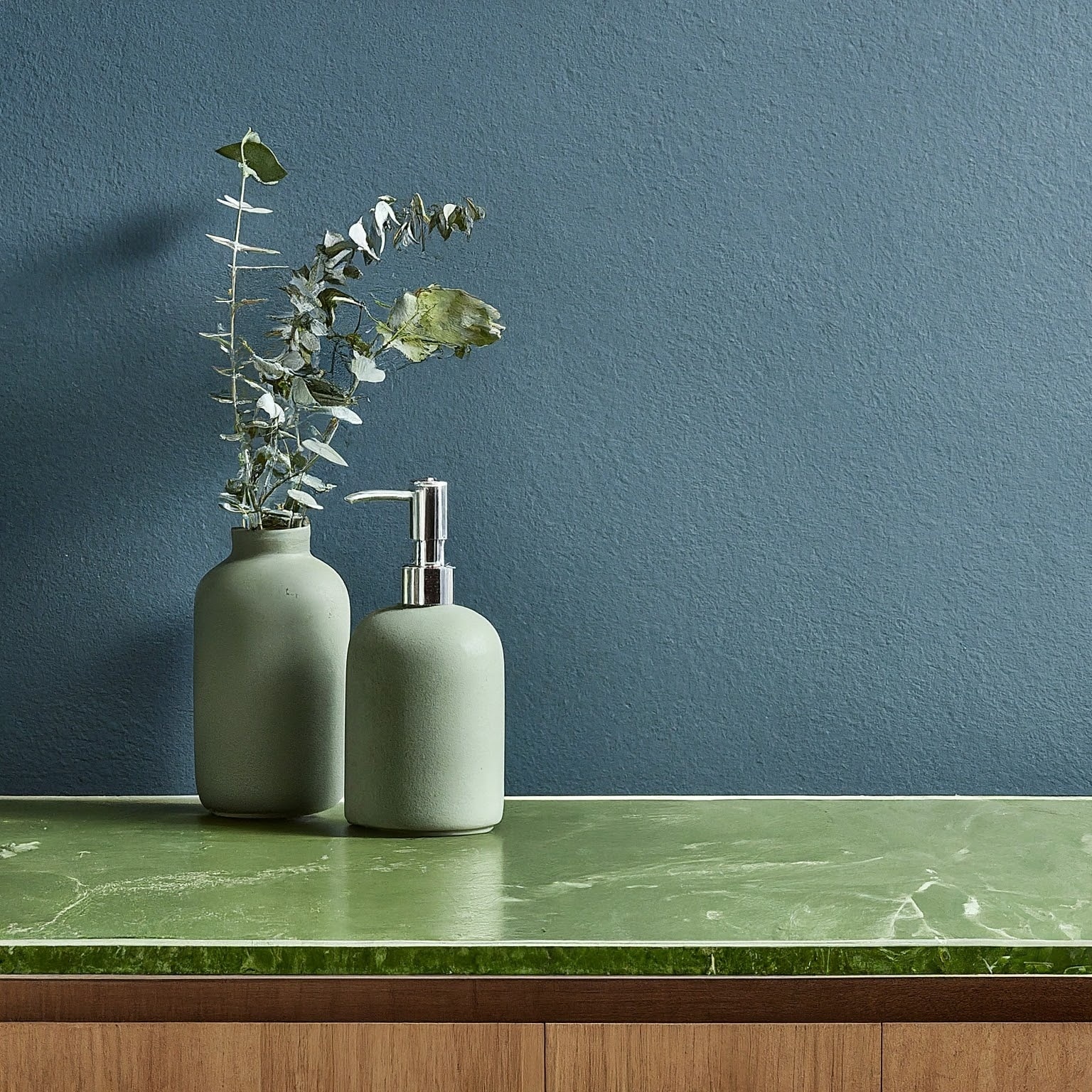 green bathroom countertop texture, blue walls, well-lit, high resolution