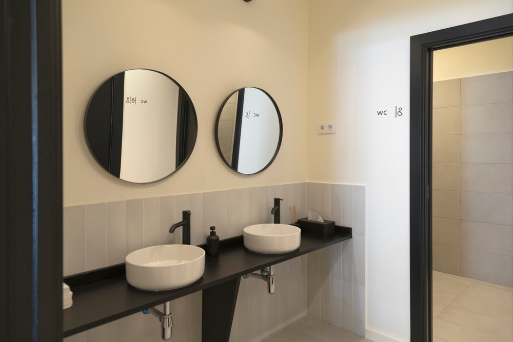 Modern Bathroom Vanity With Dual Basin Sinks Round Mirrors 