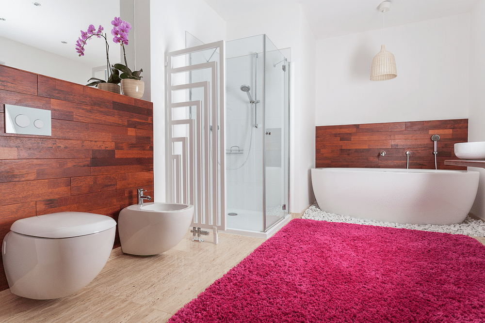 Pink carpet in bright spacious bathroom