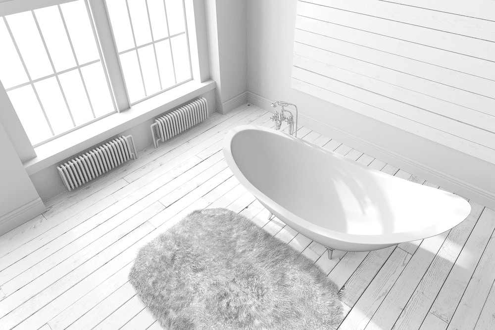 minimalist white mat in bathroom with white bathtub